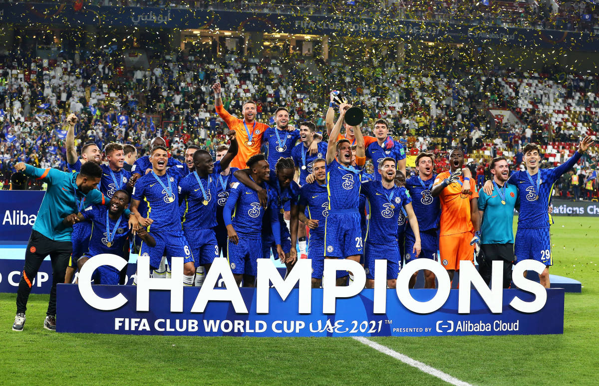 Chelsea players celebrate with the FIFA Club World Cup trophy